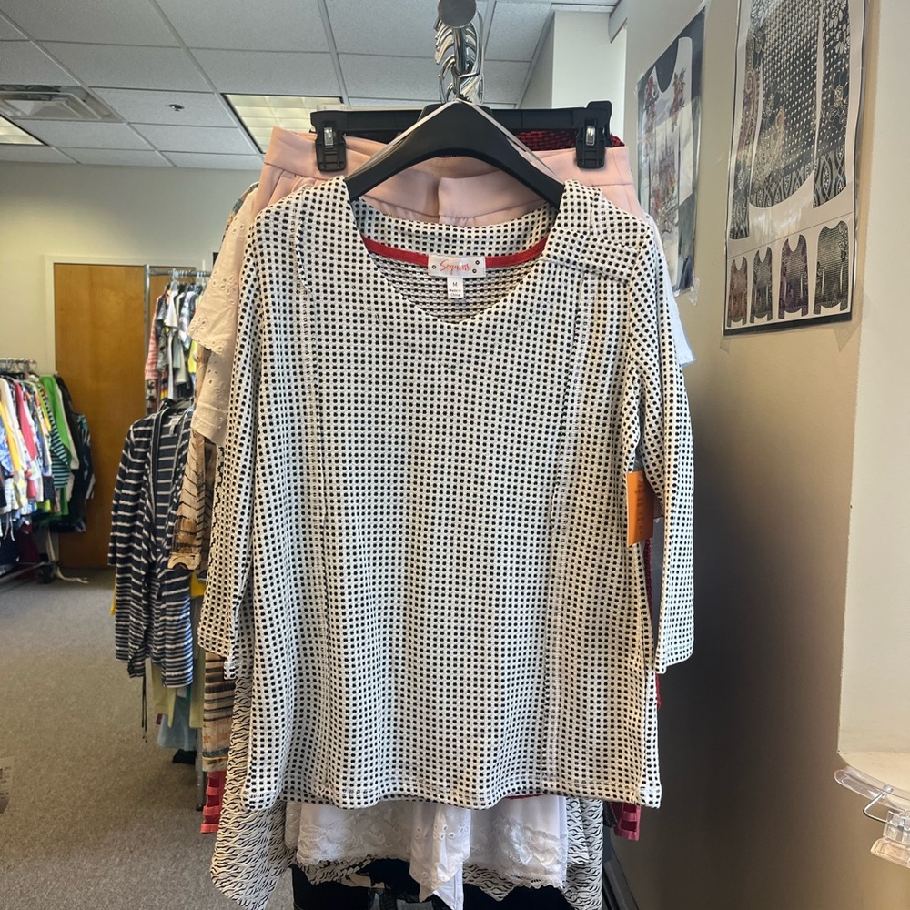 Woman’s Black and White Patterned Top